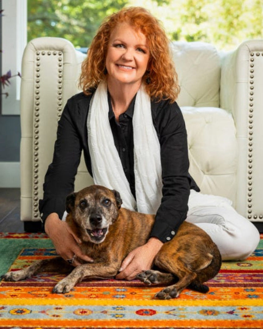 Author Vilas Wright with her dog